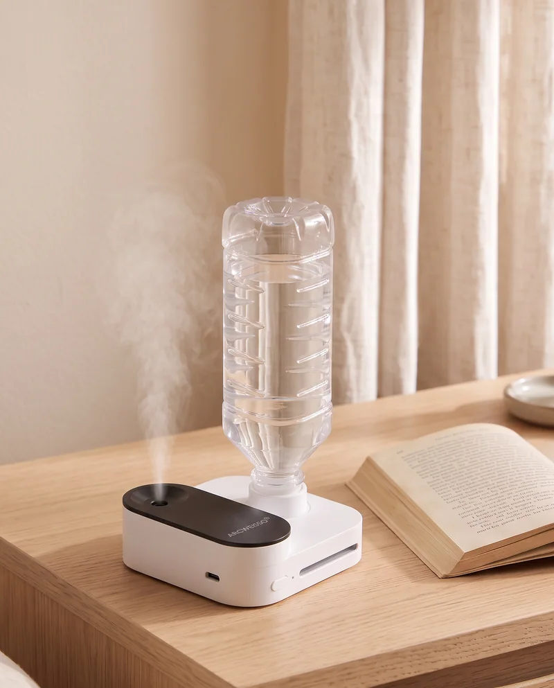 Illustrative warm bedside scene with a portable bottle humidifier and an open book
